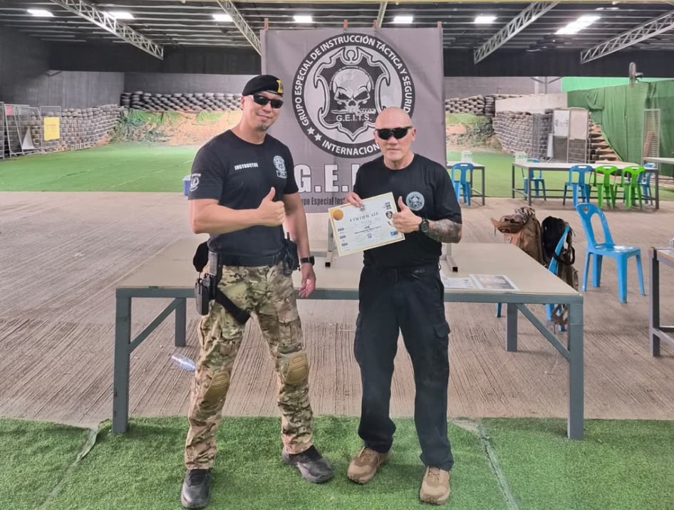 Derek Ng receiving G.E.I.T.S. certification from Chief Instructor Jong Chan Choi