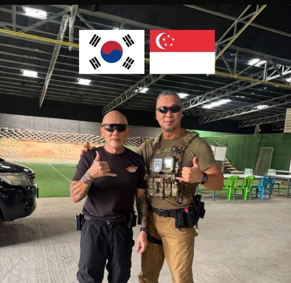 Derek Ng with G.E.I.T.S. instructor — Korea-Singapore training exchange
